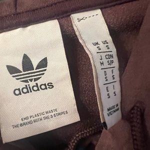 Adidas suede track suit in dark purple.